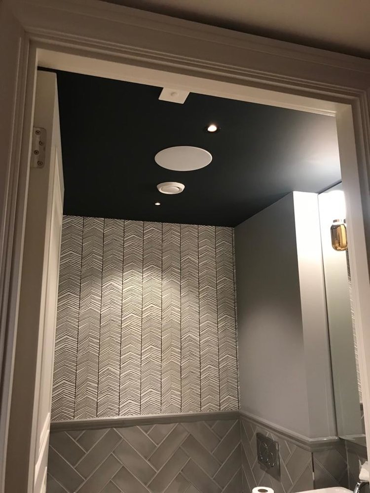 Bathroom with in-ceiling speakers