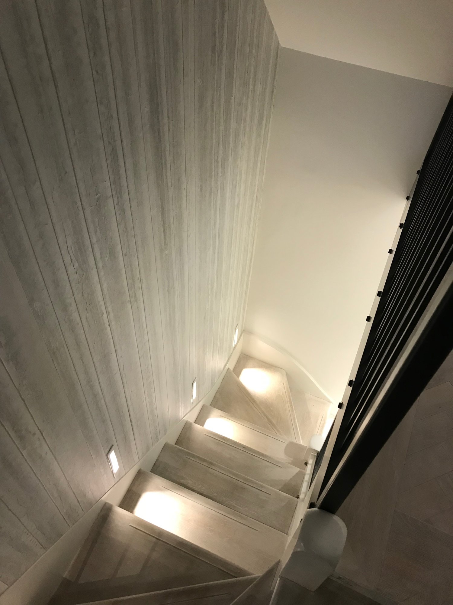 Staircase with LED spotlights on the stairs