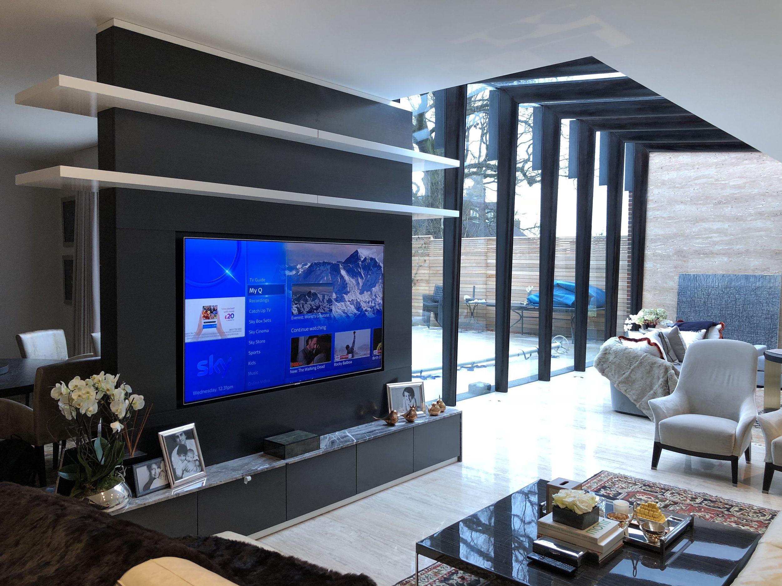 Living room with wall mounted OLED TV