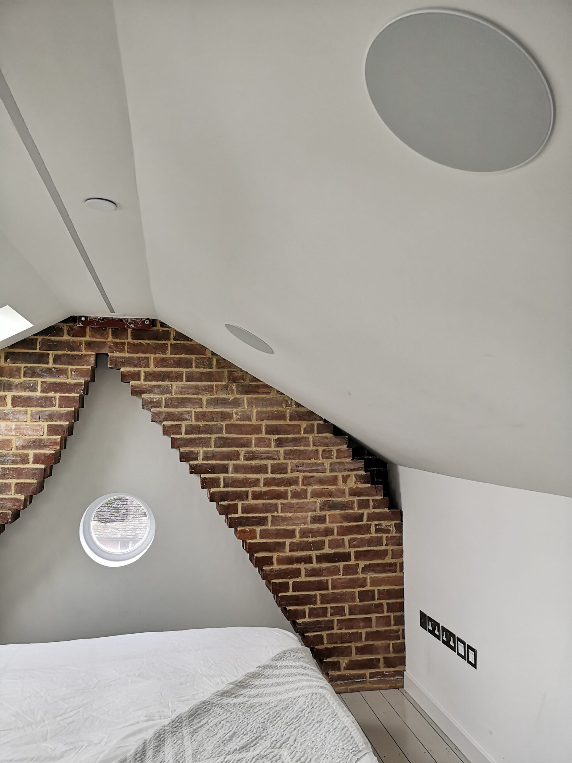 Close up of a Klipsch in-ceiling speaker