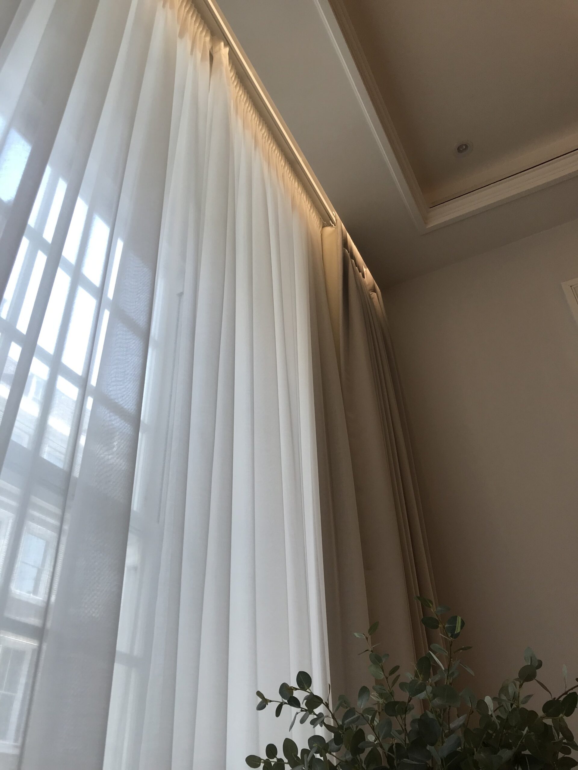 low angled shot of curtains with LED light