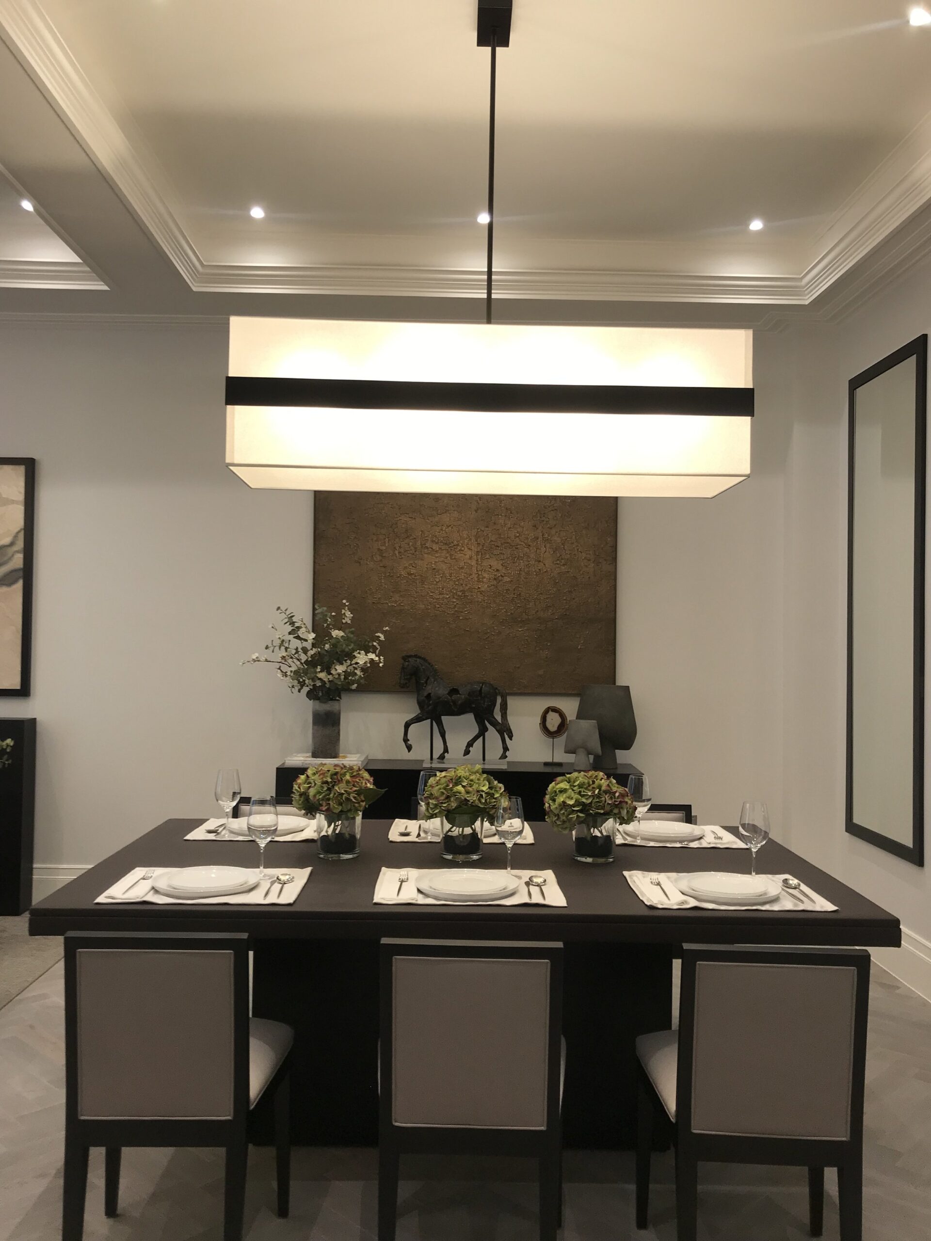 Dining room with low hanging pendant light