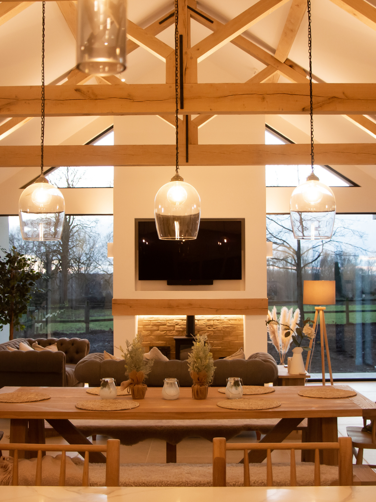 Suffolk home interior in the kitchen with full length windows, smart TV and layered lighting design